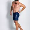 A man wearing aqua