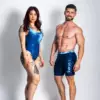 A man and a woman wearing blue pacific waves