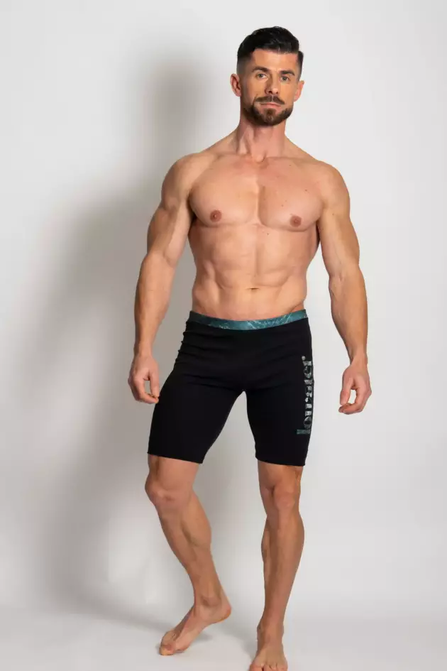 A man wearing green pacific waves